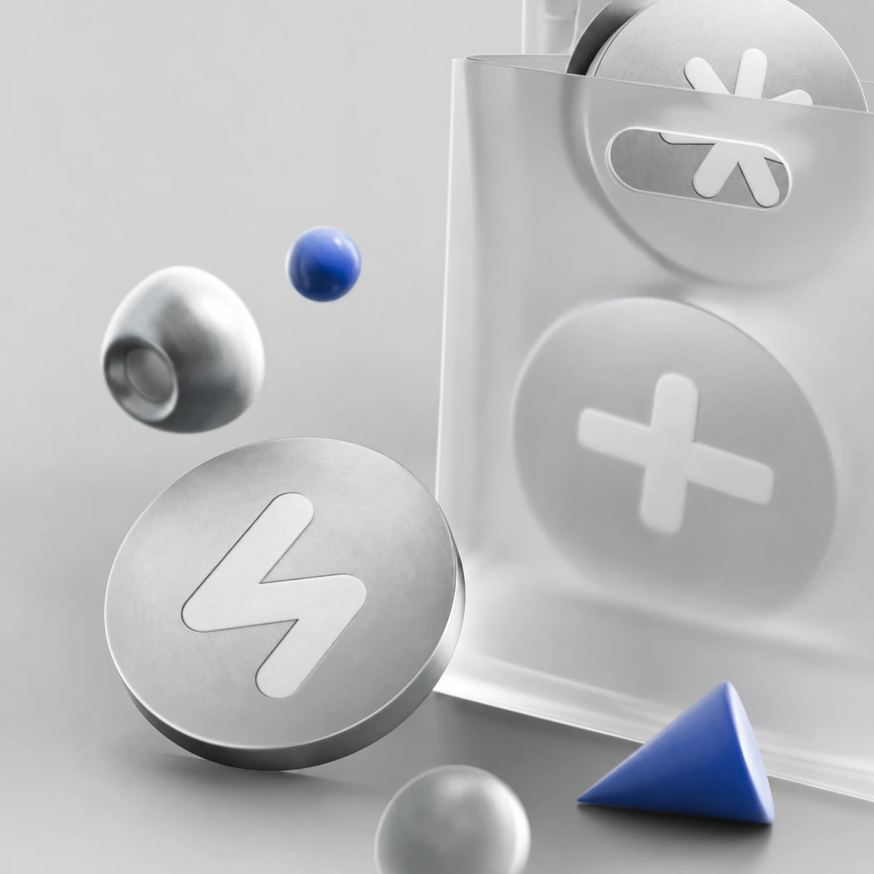 A premium 3D product still life of brushed-metal coins embossed with simple glyphs, paired with a frosted-glass bag and accent shapes in cobalt blue.