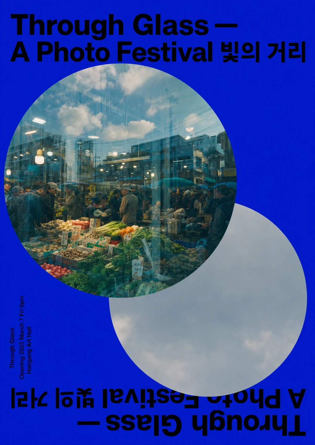 A bold electric-blue photo festival poster featuring two overlapping circular photographic windows on a saturated blue field with mirrored top-and-bottom typogr
