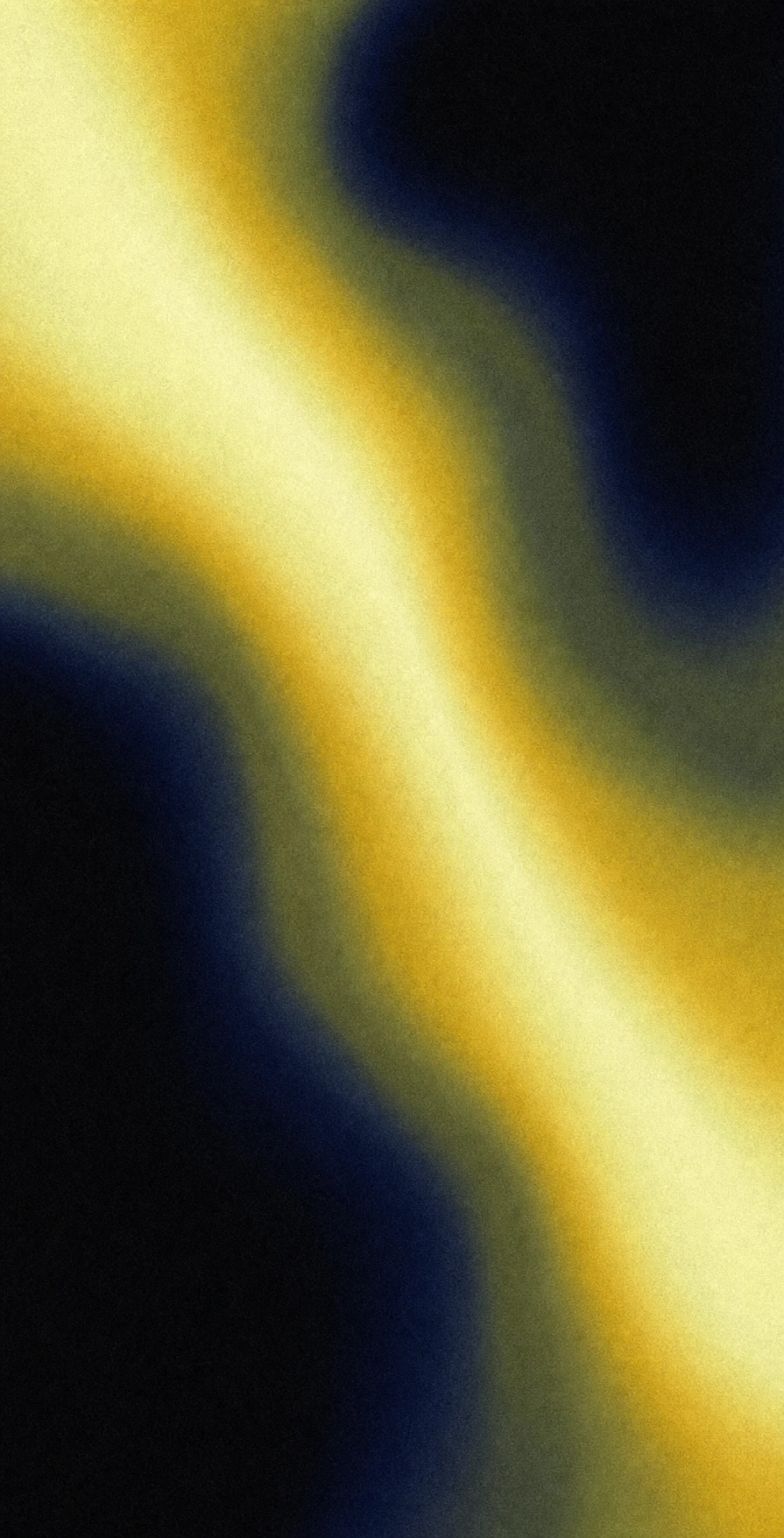 An abstract grainy gradient with a glowing diagonal river of yellow light flowing between deep dark navy-black fields.