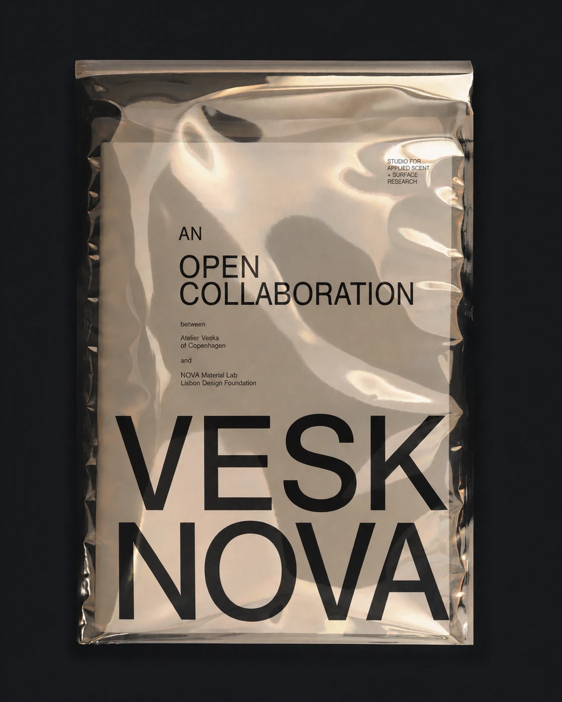 A vacuum-sealed translucent plastic pouch printed with bold black typography, photographed flat against a dark background as a tactile branding poster.
