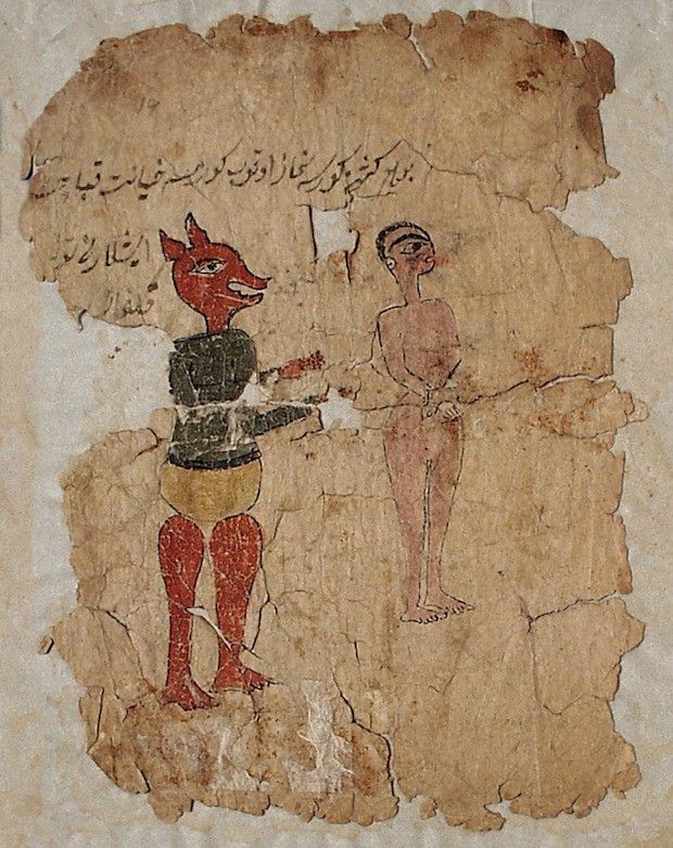 A fragment of an ancient manuscript or illustration, likely from a medieval Arabic text. The illustration depicts a fantastical scene with a fox-like creature offering a reddish object to a nude human figure. The background is a heavily aged, tan-colored parchment with significant wear and tear around the edges.