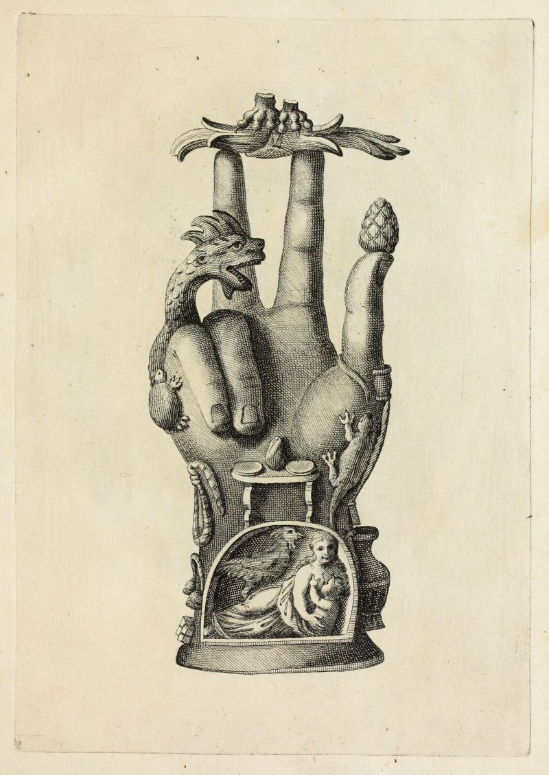 A black and white engraving of a sculpted hand with a dragon and a woman cradling a baby in the palm.