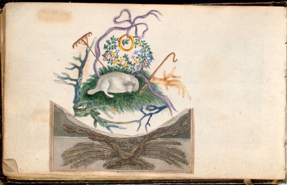 Vintage illustration of a white rabbit resting on a green mound of foliage with flowers and a wreath, on a cream-colored page.