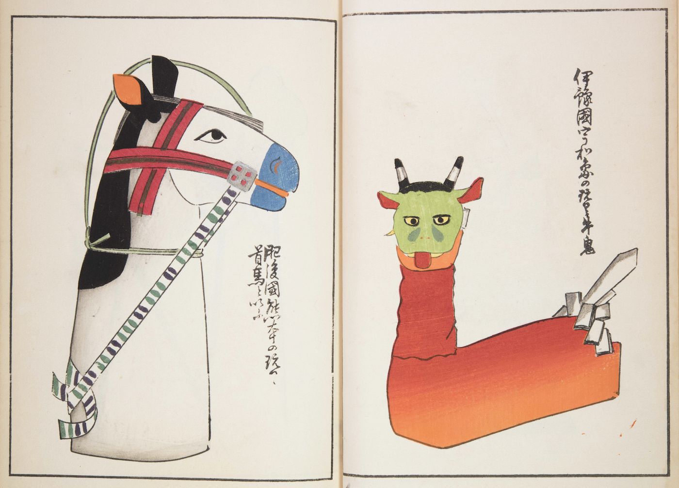 Open book with two pages, each featuring a stylized illustration of a creature's head attached to a long, cylindrical body.