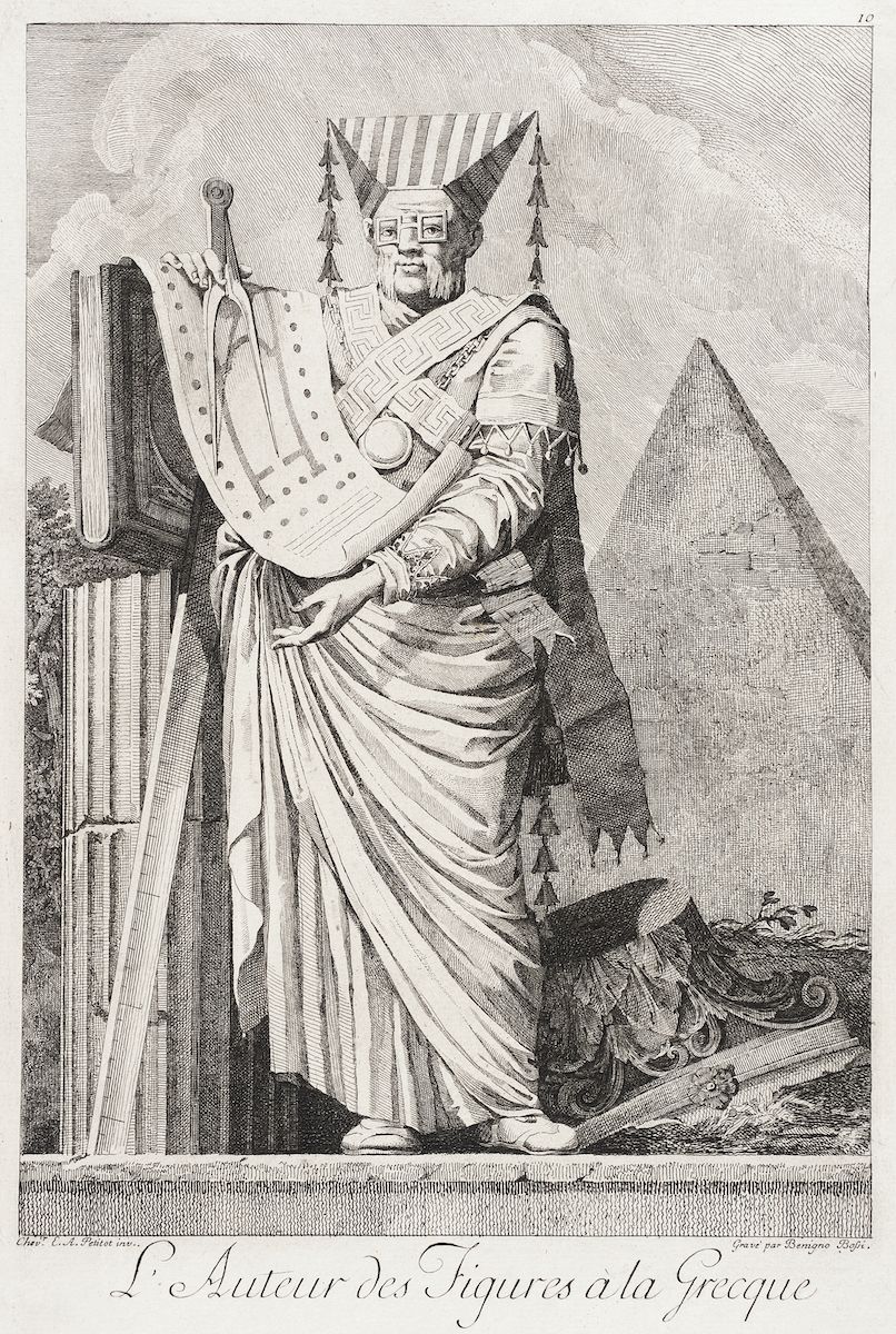 A detailed black and white engraving of an ancient Egyptian figure in elaborate clothing, holding a scroll and writing instrument, with pyramids and columns in the background.