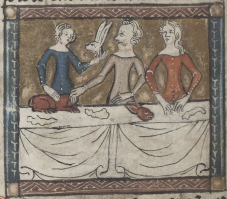 Medieval illustration of three people seated around a table with two rabbits being offered to them.
