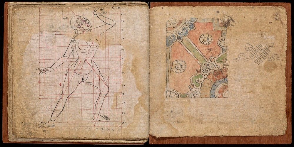 Open book with anatomical drawing of a skeleton on the left page and decorative ornament with a cross on the right page.