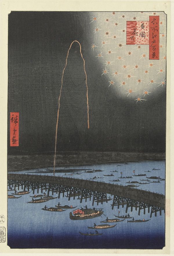 Vintage Japanese woodblock print of fireworks over water.
