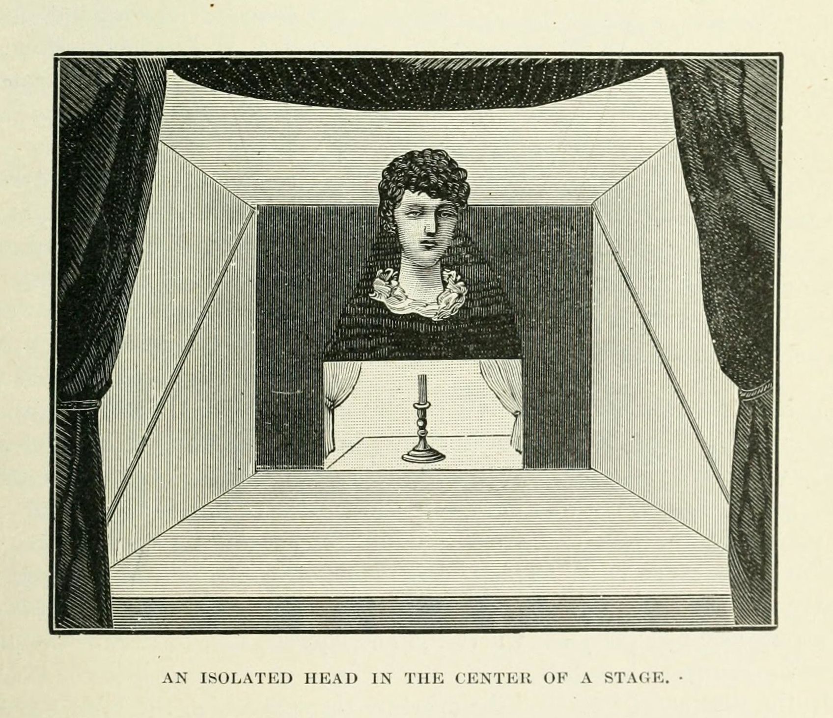 An isolated head in the center of a stage.