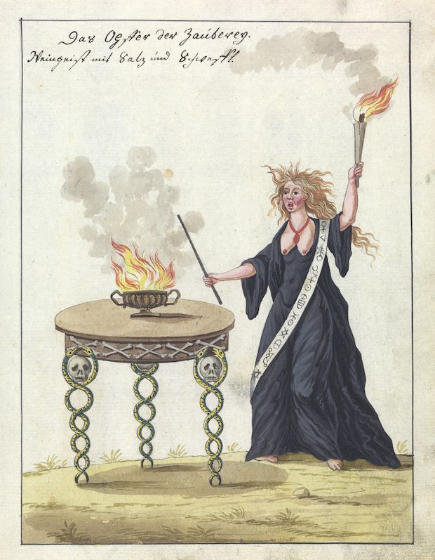 A hand-colored etching of a woman performing a witchcraft ritual before a skull-legged table with a burning brazier.