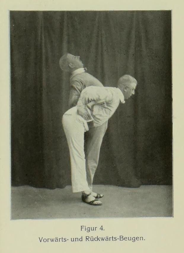 Vintage black and white photograph of two bald men bending forward at the waist in a physical exercise.