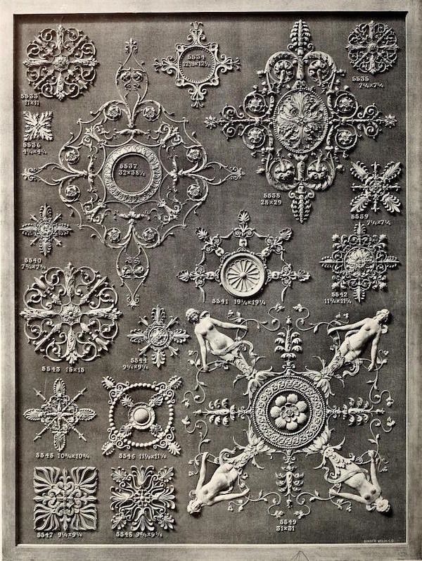 A black and white catalog page filled with ornate plaster casts or molds, showcasing a collection of designs ranging from floral and geometric patterns to figurative elements like angels and cherubs.