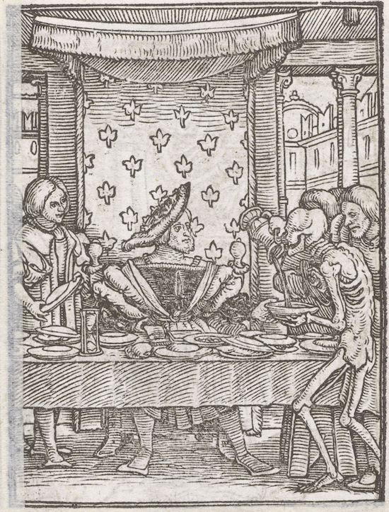 A black and white woodcut image depicting a grim scene within a room. A long table dominates the foreground, covered with a cloth. Around the table are seated figures, some living and some skeletal.