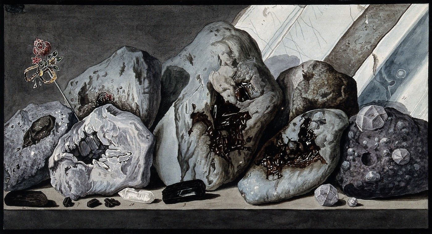 Vintage scientific illustration of a collection of rocks, crystals, and minerals, with an ornate staff and a window in the background.