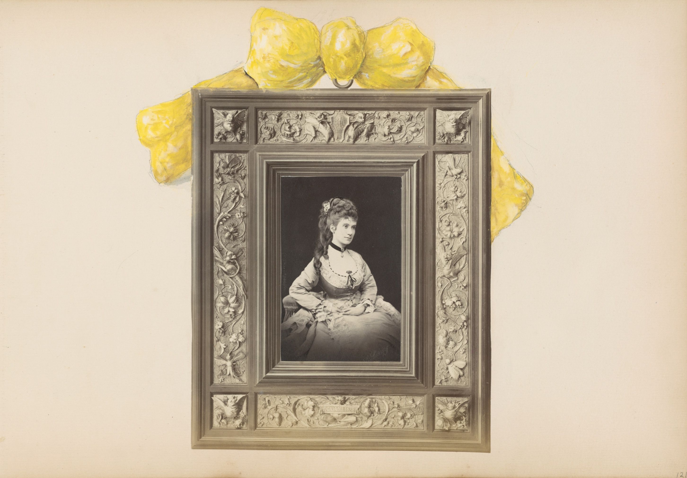 A framed portrait of a woman with a yellow ribbon.