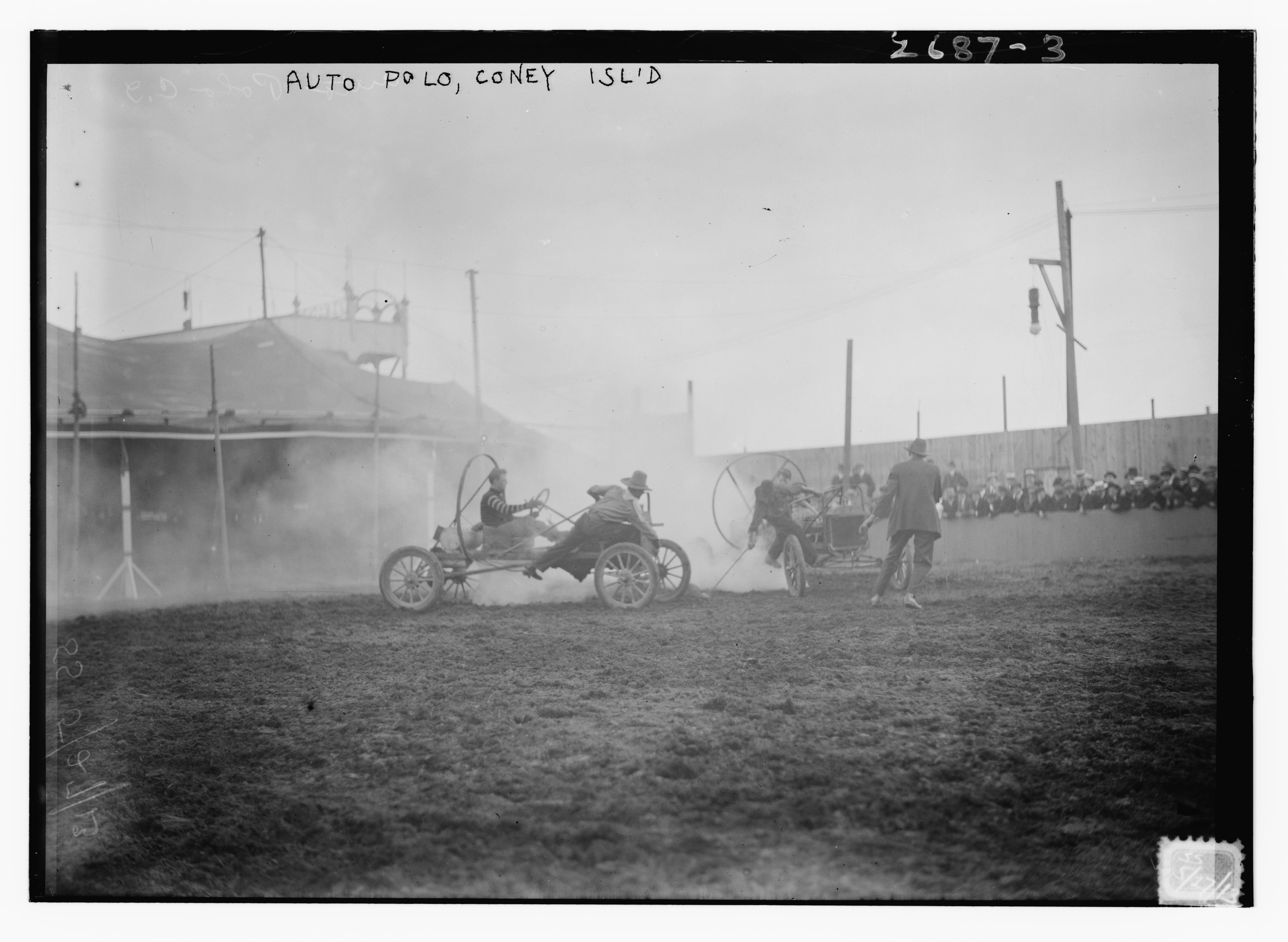A black and white photograph of an auto polo match at Coney Island, featuring a vintage automobile speeding across a grassy field with a player leaning out to strike a ball.