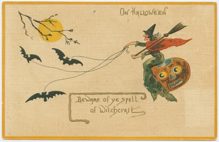 Vintage Halloween postcard with a witch riding a pumpkin, bats flying around, and a crescent moon in the background.