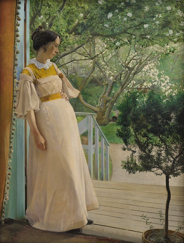 A painting of a woman in a cream-colored dress standing on a porch looking out into a garden.