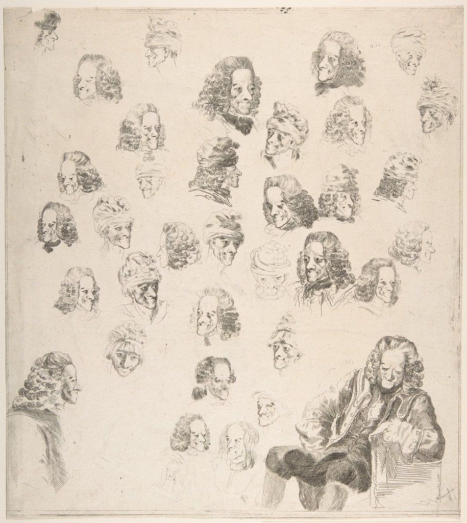 A black and white sketch featuring numerous head portraits scattered across the page.
