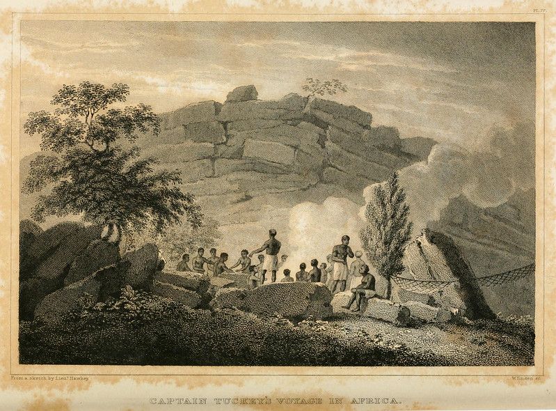 Vintage black and white engraving of Captain Tuckey's Voyage in Africa, depicting a group of people gathered in a rocky landscape.