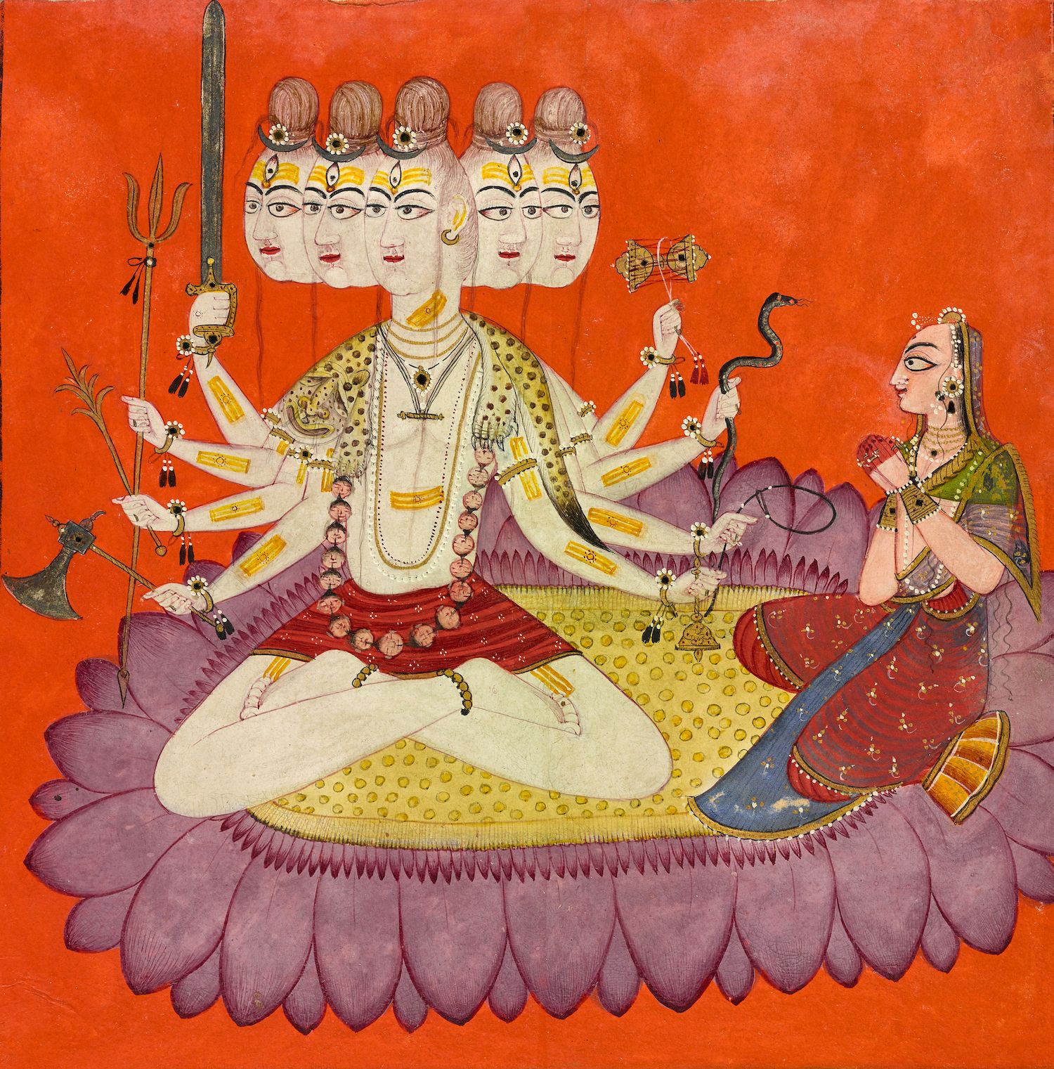 A vibrant painting of a multi-headed deity seated on a lotus flower, with a woman kneeling in reverence to the right. The background is bright orange, and the painting style is traditional with detailed patterns and symbolic imagery.