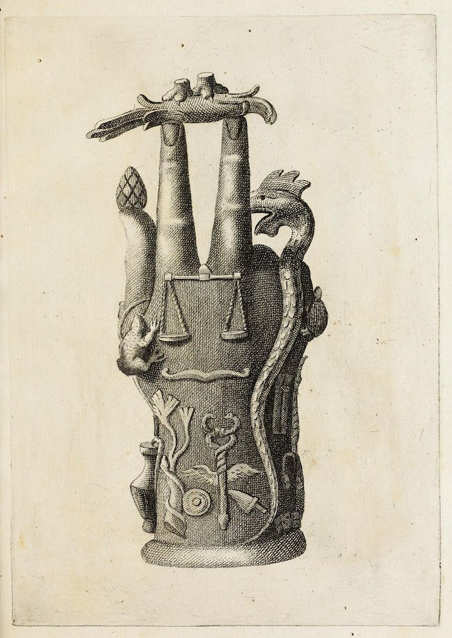 A black and white engraving of an ornate, fantastical statue with scales and a dragon.