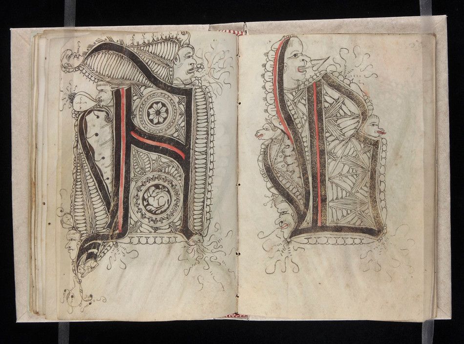 Open book with ornate initial letters 'H' and 'B'.