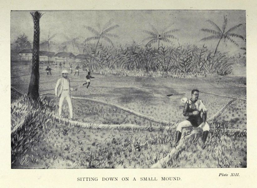 A black and white illustration of a person sitting on a small mound in a grassy field, with another person standing nearby and trees in the background.