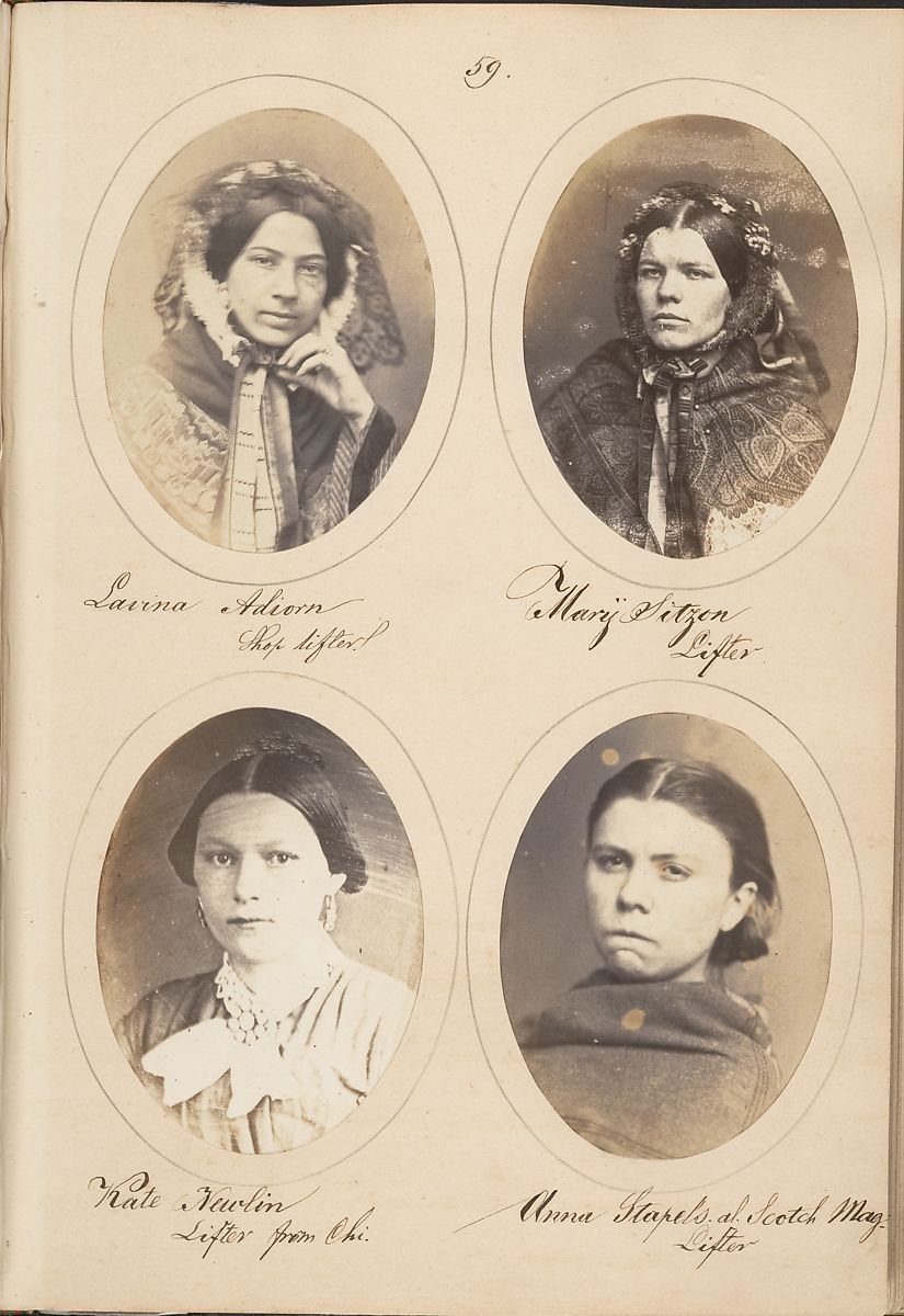 Four oval portraits of women in Victorian-era clothing, arranged on a page from a vintage photo album.