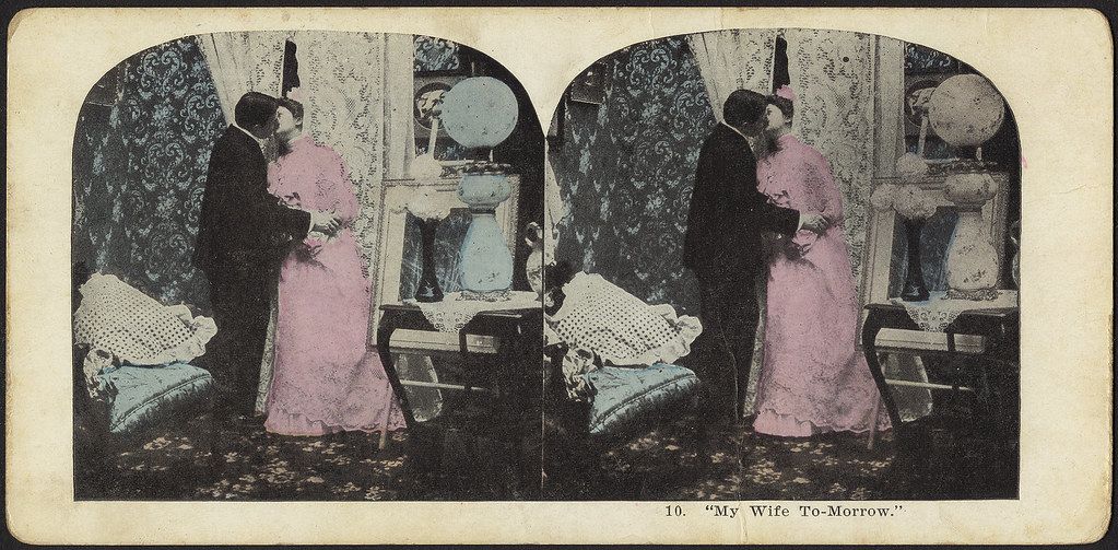 Stereoscopic card depicting a woman in mourning in a Victorian-era room.