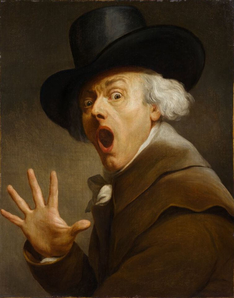 Portrait of a man in a hat with a shocked expression.