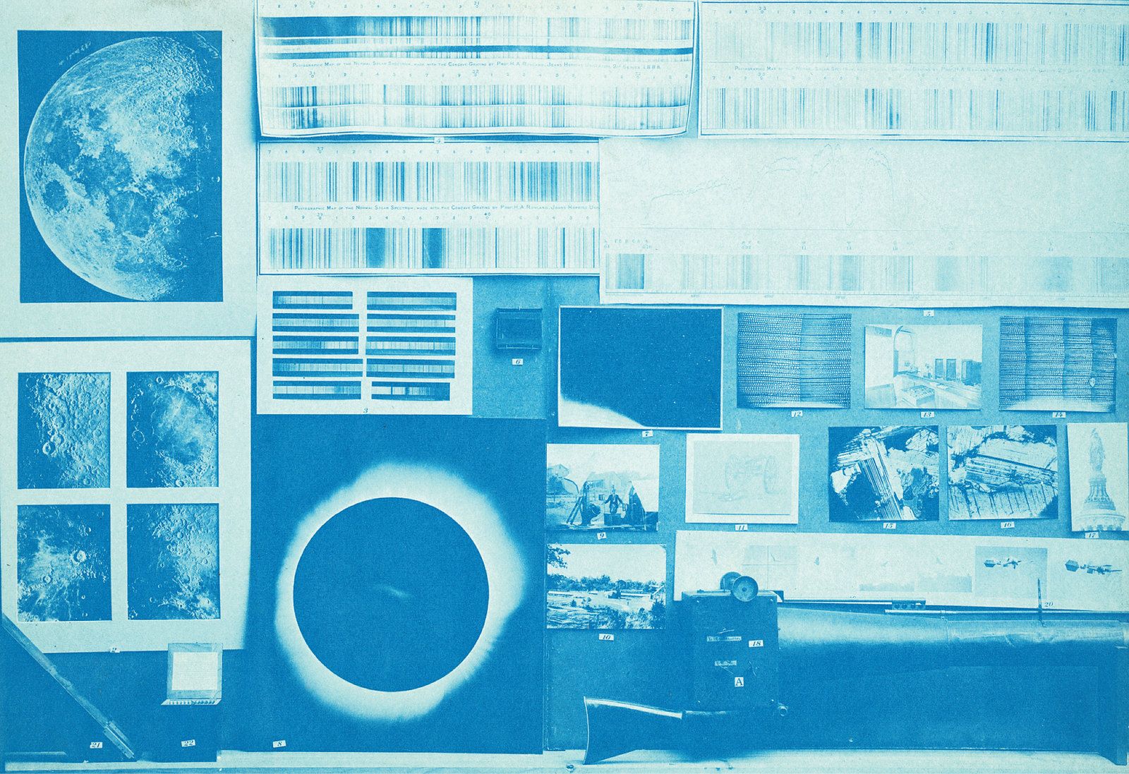Vintage cyanotype photograph of a wall covered in scientific images and equipment, including lunar photographs, an eclipse image, spectrograms, and control panels.