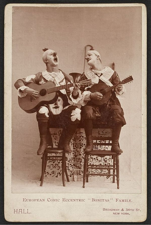 A vintage sepia-toned photograph of two performers, identified as the “Bonitas” family, in a theatrical pose.
