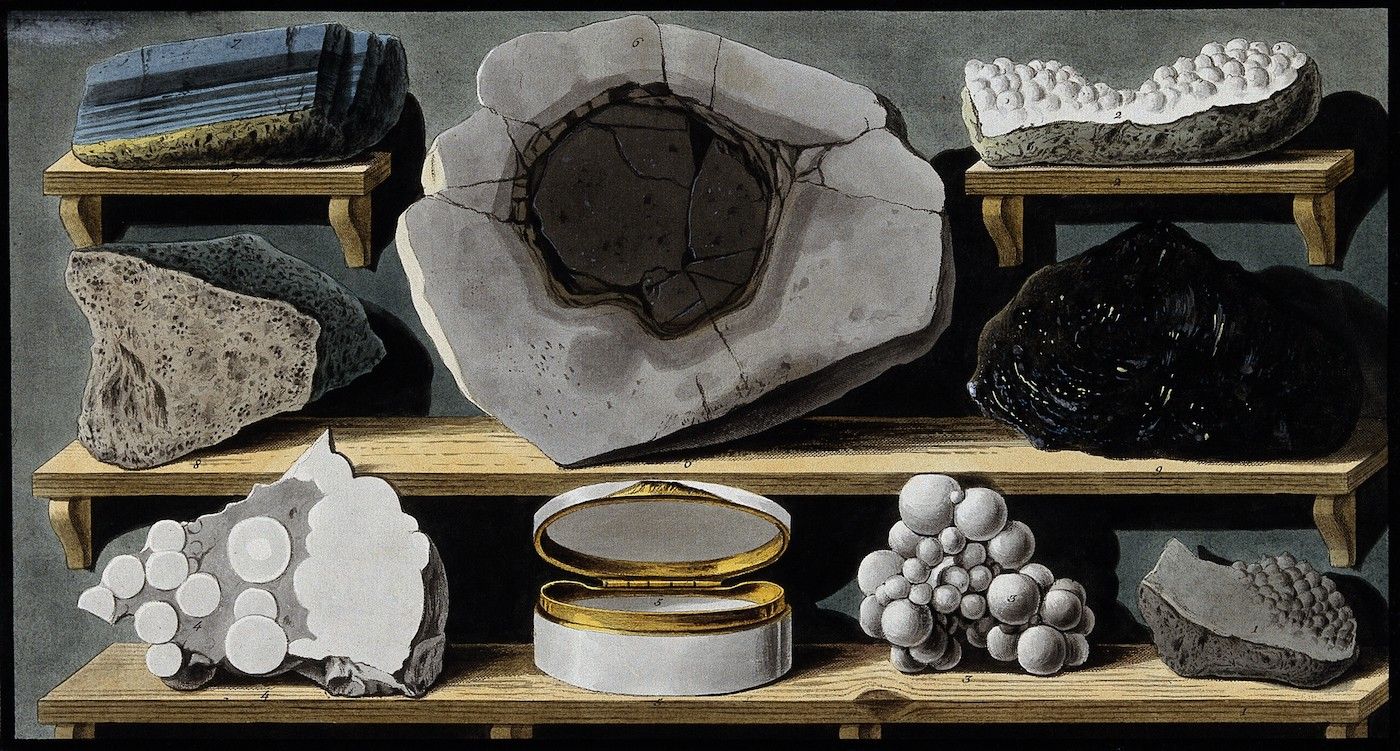 Vintage illustration of geological specimens on wooden shelves.