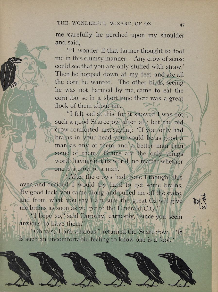 A black and white illustration from 'The Wonderful Wizard of Oz' showing a scarecrow with a crow perched on its shoulder, surrounded by birds in a cornfield.