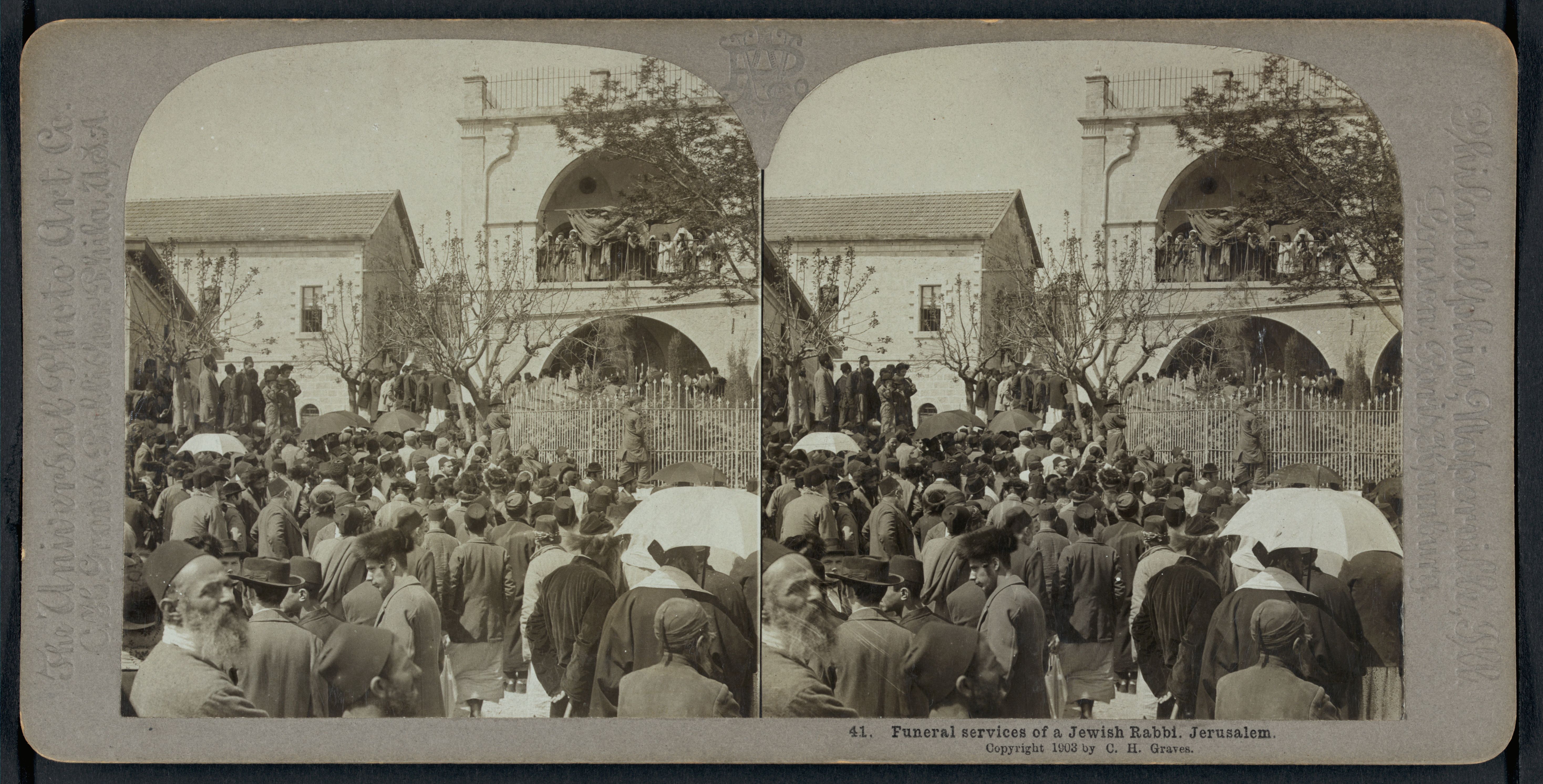 Stereoscopic photograph of a large crowd of people gathered for the funeral services of a Jewish Rabbi in Jerusalem.