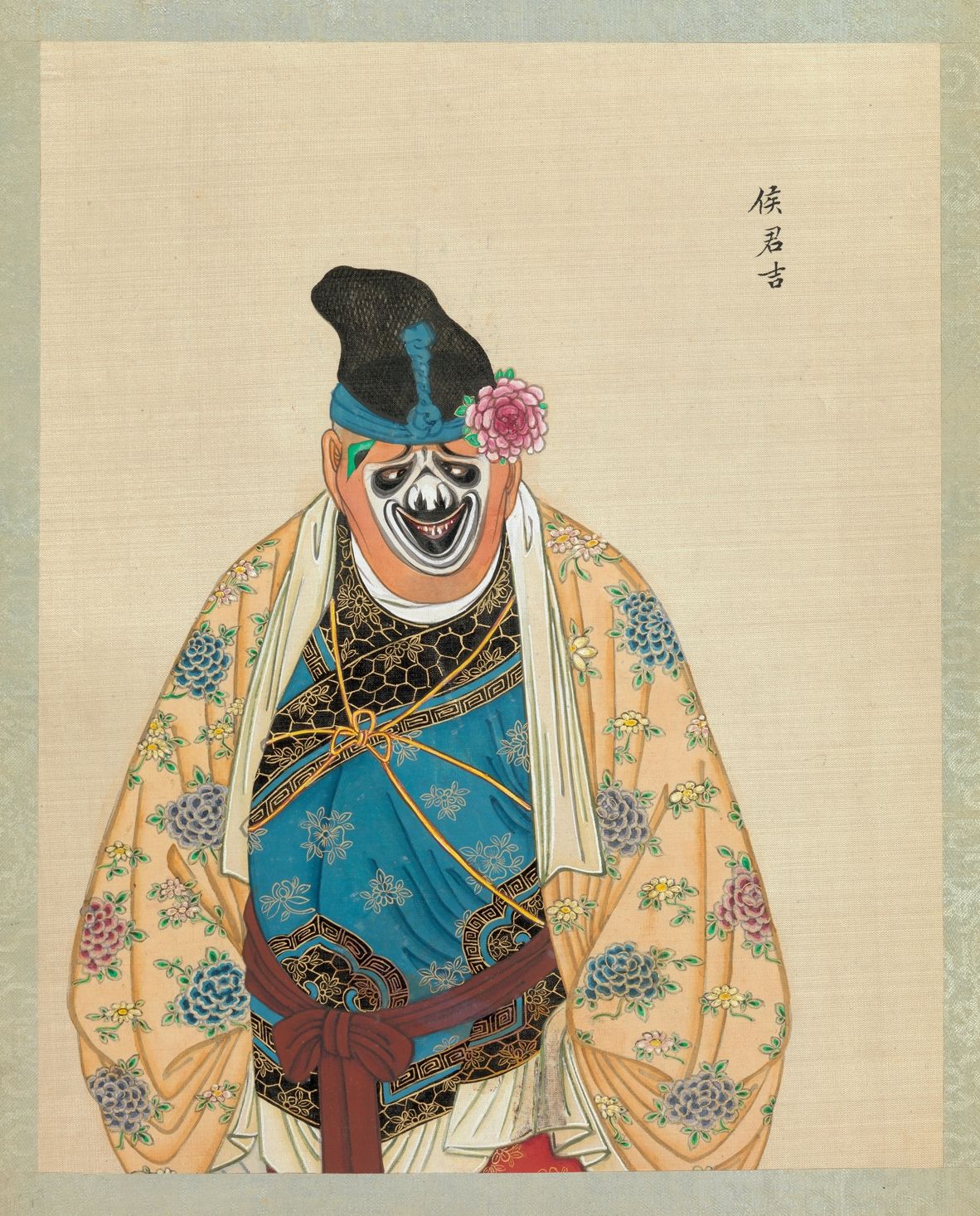 Vintage-style portrait of a person in a patterned robe and mask.