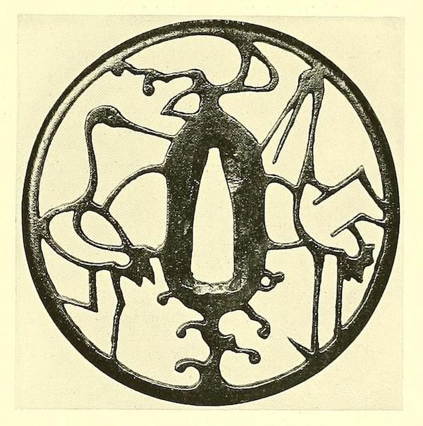 A circular, ornate design rendered in black and white with abstract shapes and floral motifs.