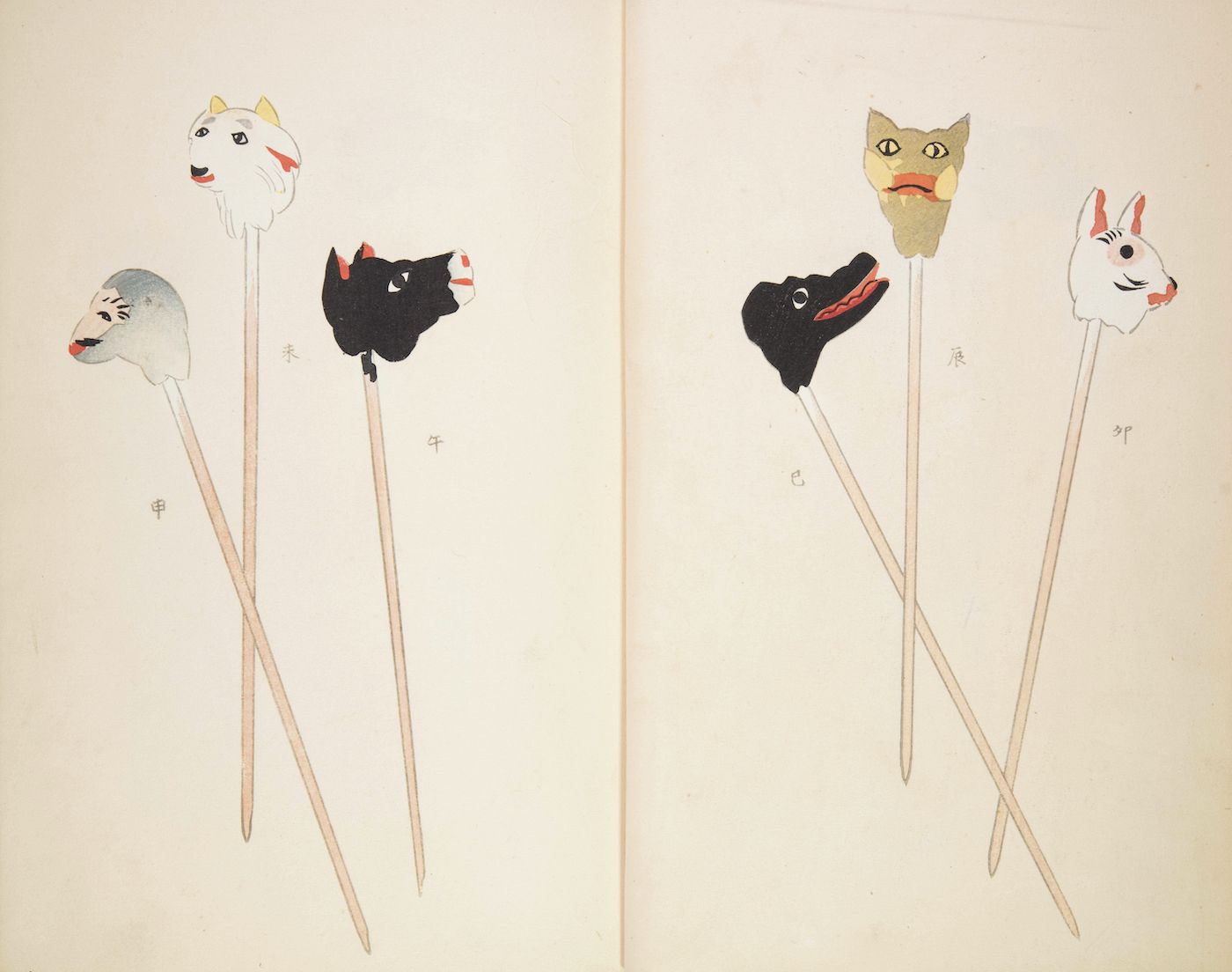 Illustration of traditional Japanese puppets mounted on sticks, with stylized animal heads resembling masks.