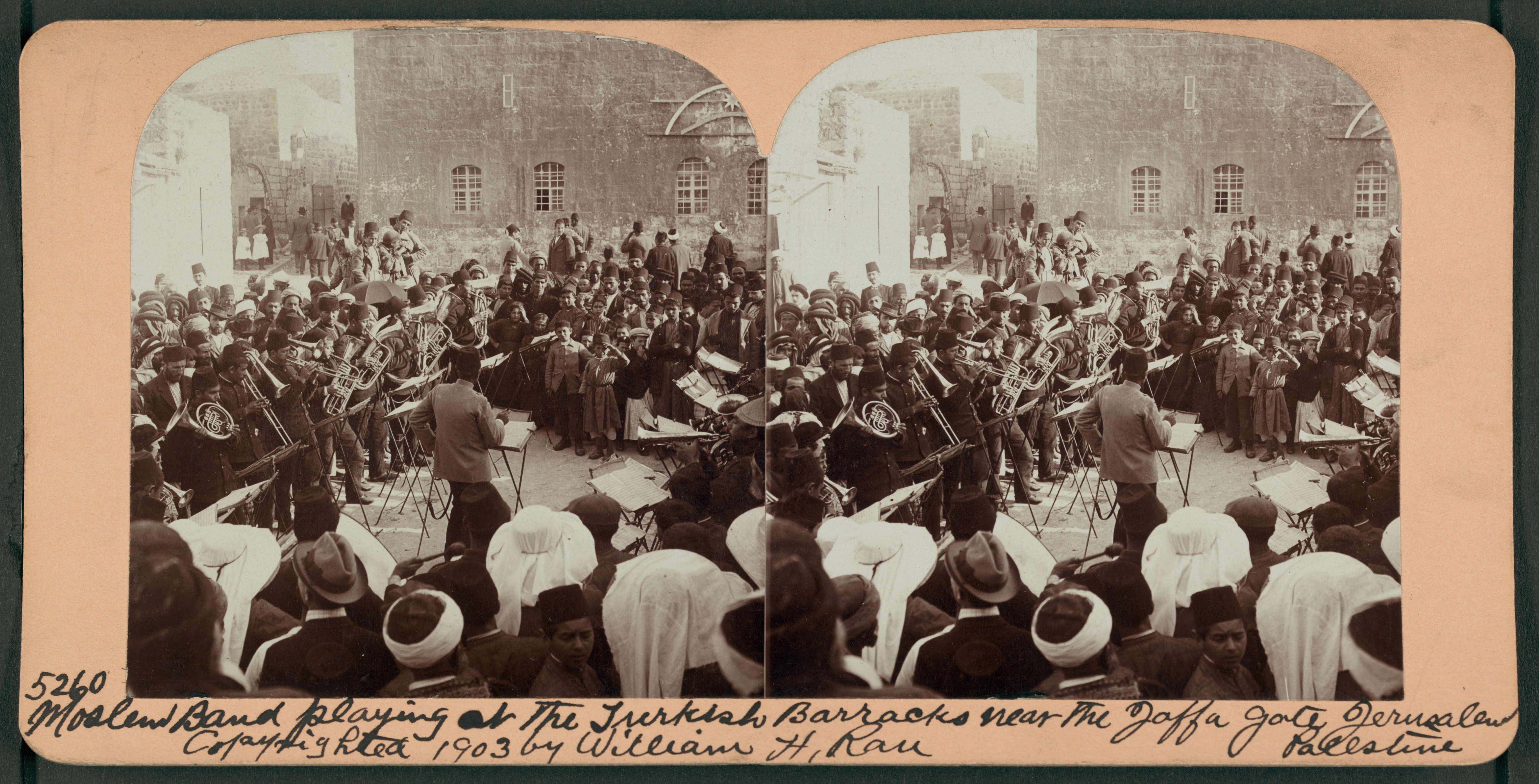 Stereoview photograph of a Moslem band playing at the Turkish Barracks near the Jaffa Gate in Jerusalem, Palestine, in 1903.