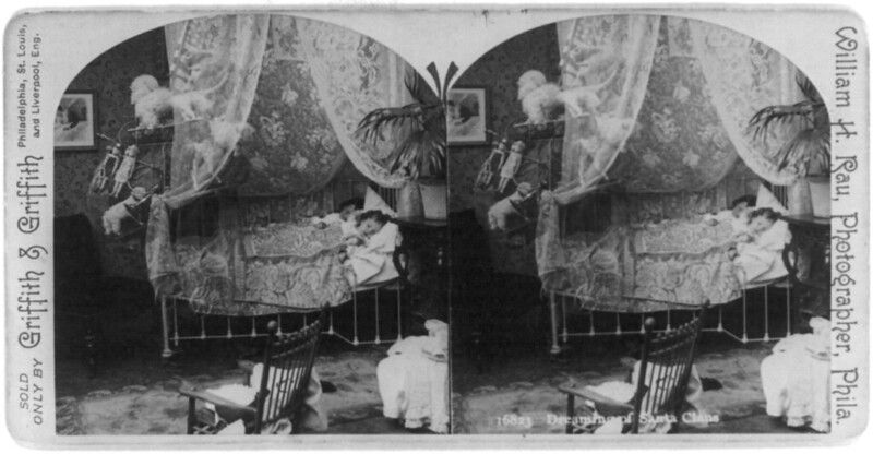Stereoscope card showing a child in a bed, labeled 'Dreamland' and 'Ohio'.