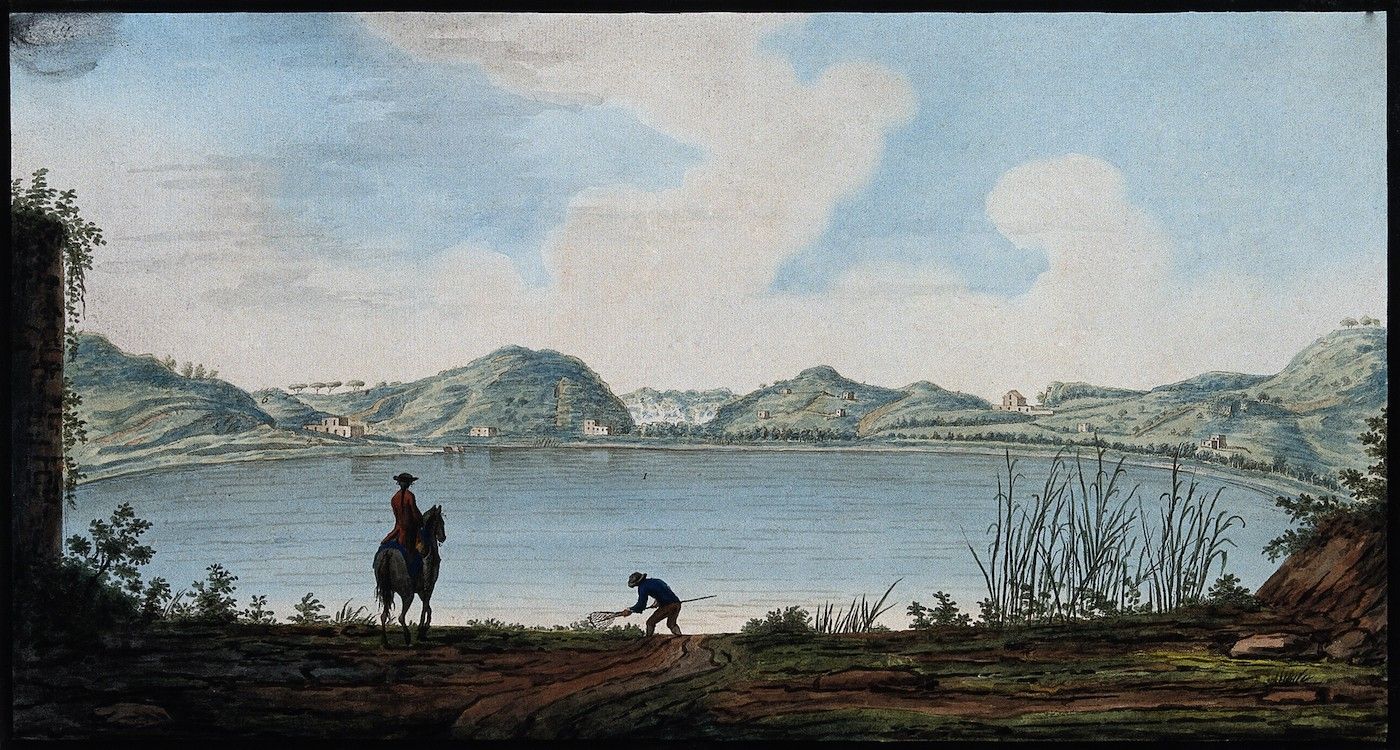 Watercolor painting of a lake surrounded by hills, with a person on horseback and another person near the water's edge.