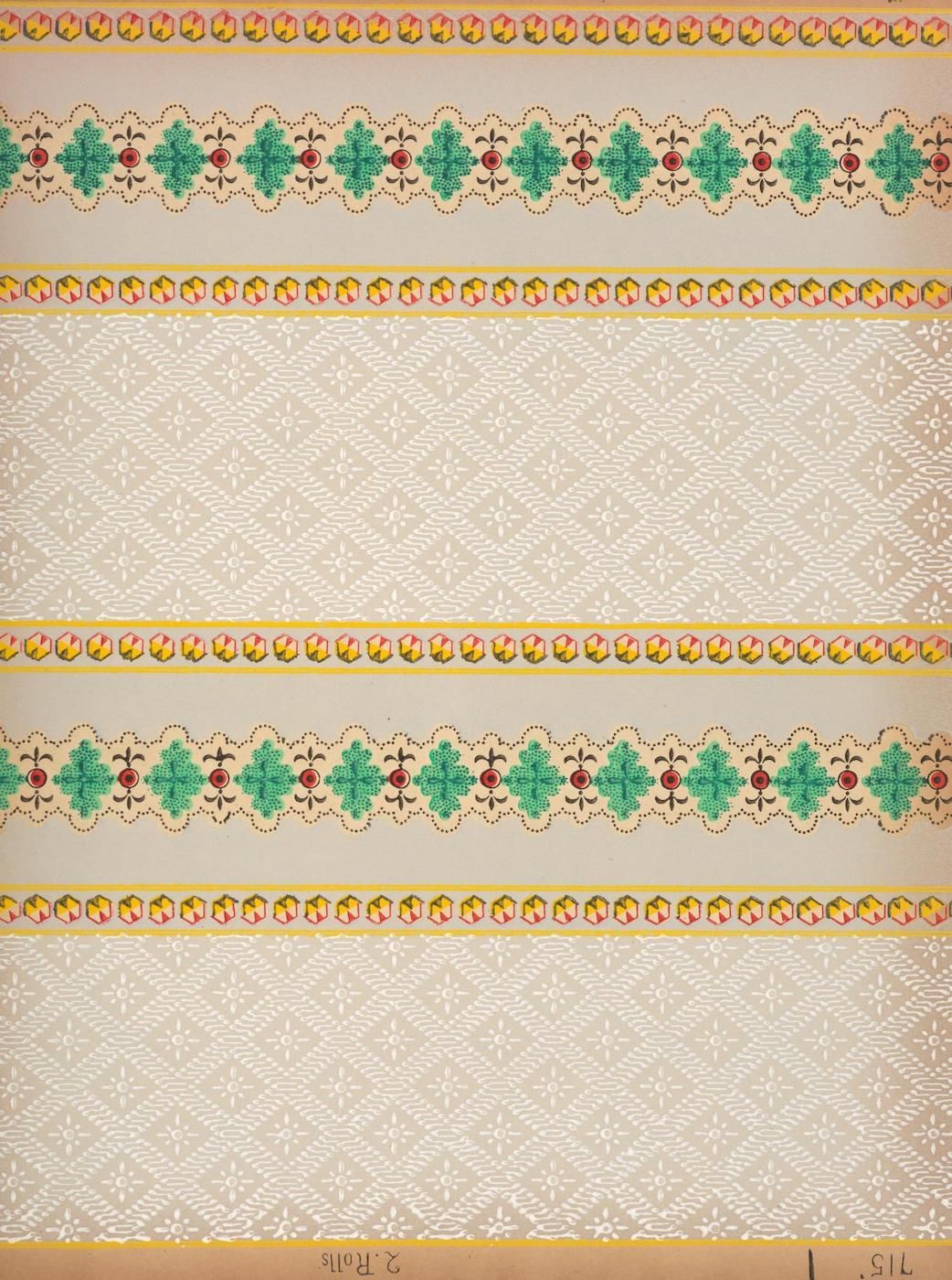 Close-up of a patterned fabric with repeating borders and a dotted background.