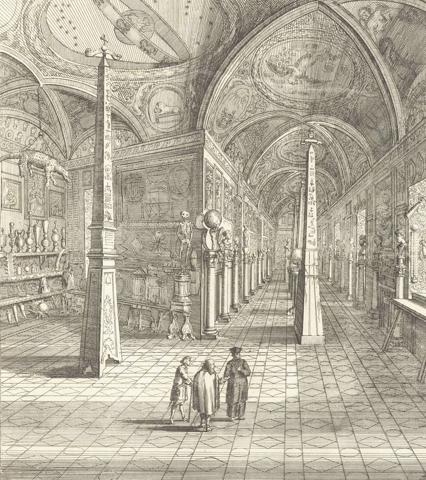A black and white engraving of a long, arched hallway filled with obelisks, columns, and artwork. A group of people are gathered in the foreground, observing the exhibits.
