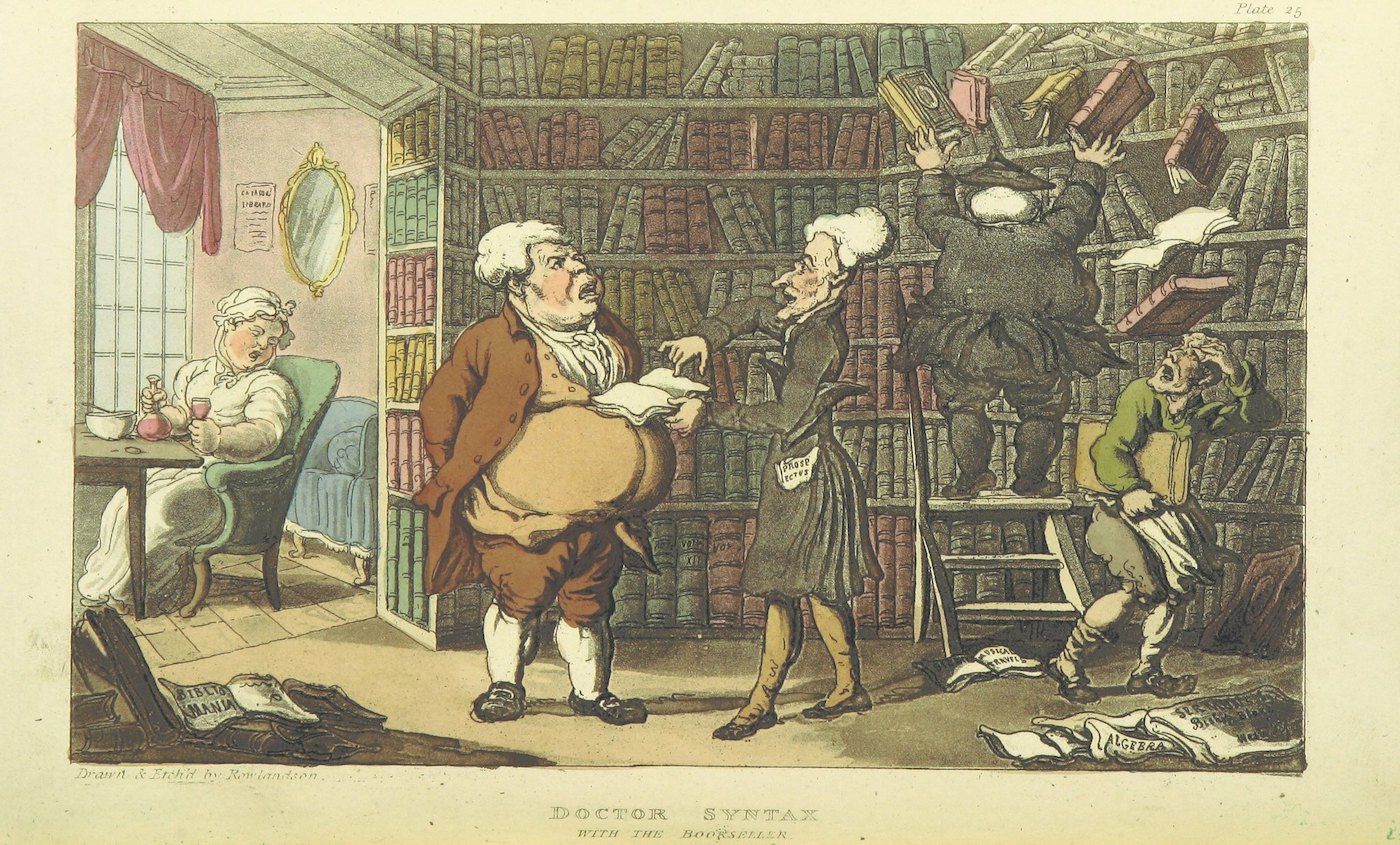 A hand-colored etching titled "Doctor Syntax with the Bookseller". The scene takes place inside a crowded, book-filled room. Bookshelves line the walls, reaching towards the ceiling, and are packed with books. The floor is littered with scattered books and papers. In the center of the room, a stout man, presumably Doctor Syntax, stands with a large belly and is holding a piece of paper. He is gesturing with his hand as if explaining something. To his right, a tall, thin bookseller is leaning forward, listening intently. To the left, a woman is seated in a chair, looking on with a somewhat skeptical expression. A window is visible behind her, and a mirror hangs on the wall. The room is filled with a sense of chaos and intellectual energy.