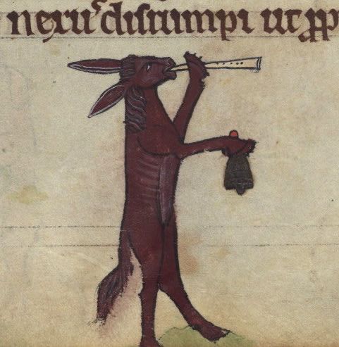 A medieval illustration of a reddish-brown rabbit standing upright and playing a trumpet while holding a small bear.