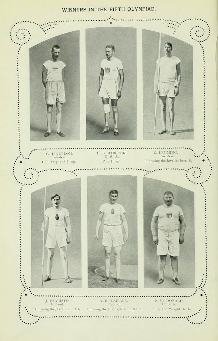 A vintage black and white photograph featuring six male athletes, identified as winners in the Fifth Olympiad. They are posed in a grid-like arrangement, each in a full-body portrait. The athletes are all wearing similar athletic uniforms: white short-sleeved shirts, short shorts, and knee-high stockings. They are also wearing athletic shoes. Each athlete is identified by name and country, along with the event they won.
