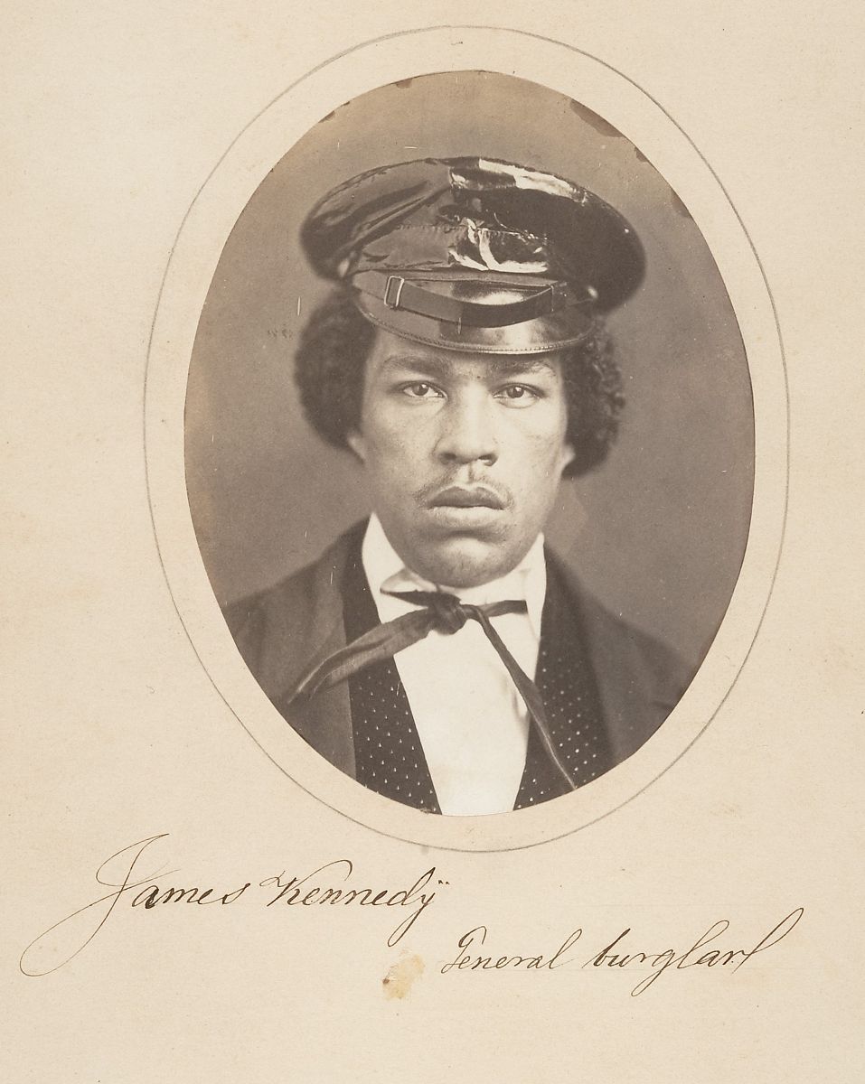 Vintage photograph of James Kennedy, identified as 'General Burglar', in a formal portrait.