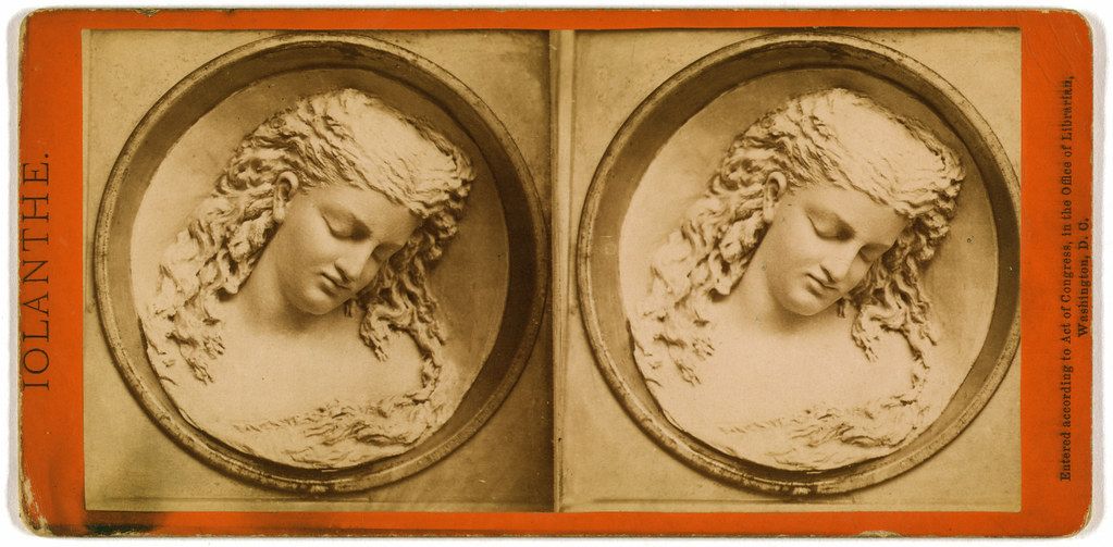 Stereoscopic card featuring a cameo portrait of a woman.