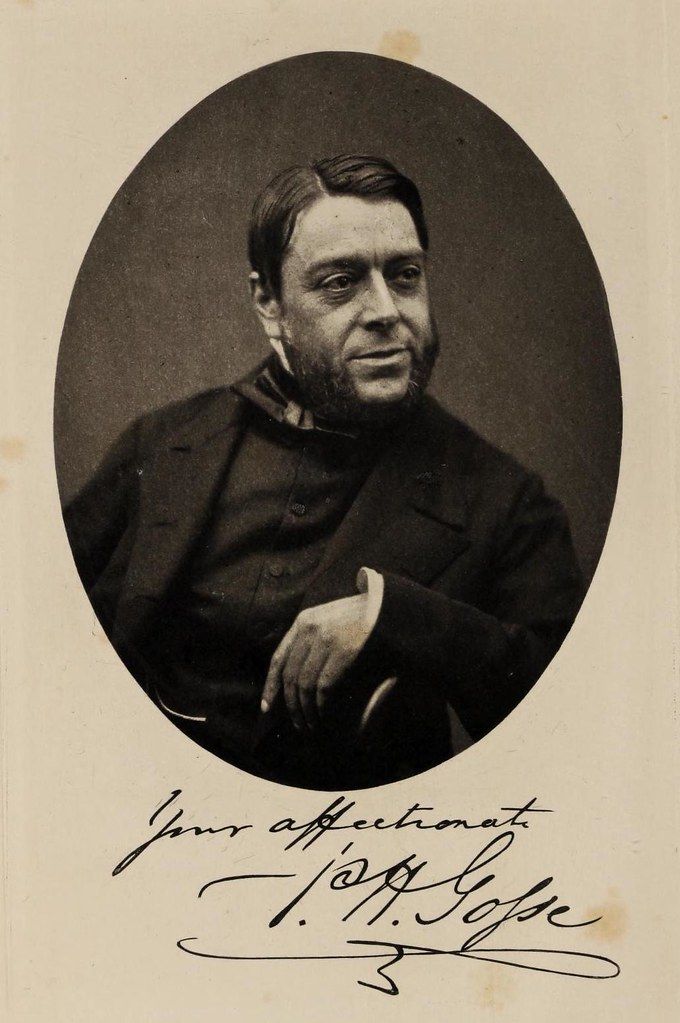 Vintage portrait of T.H. Lowe with his signature below.